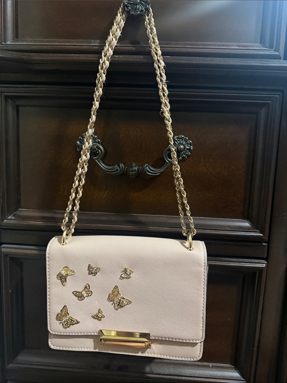 Aldo Pale Pink Crossbody with Gold Butterfly Details